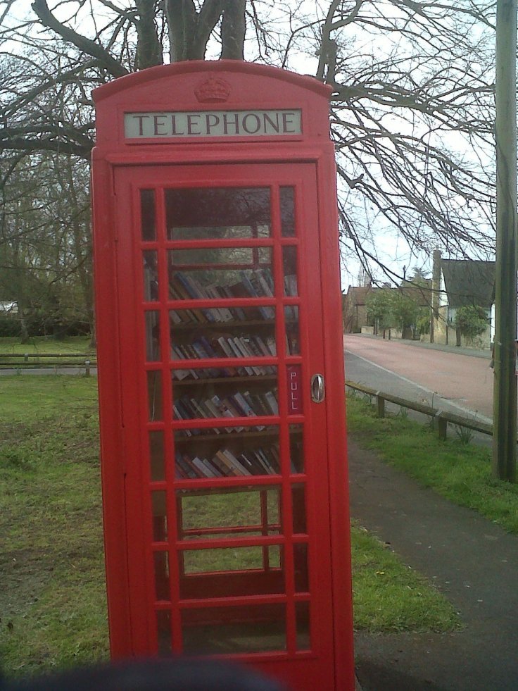 New use for telephone booth in Cambridge!! , local community library, Very creative!!