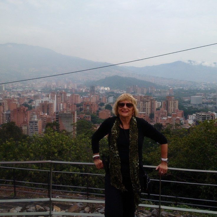 Overlooking beautiful Medillin Columbia, the railing is holding me up, been up all night ( connecting plane left early, think pilot had hot date!!)